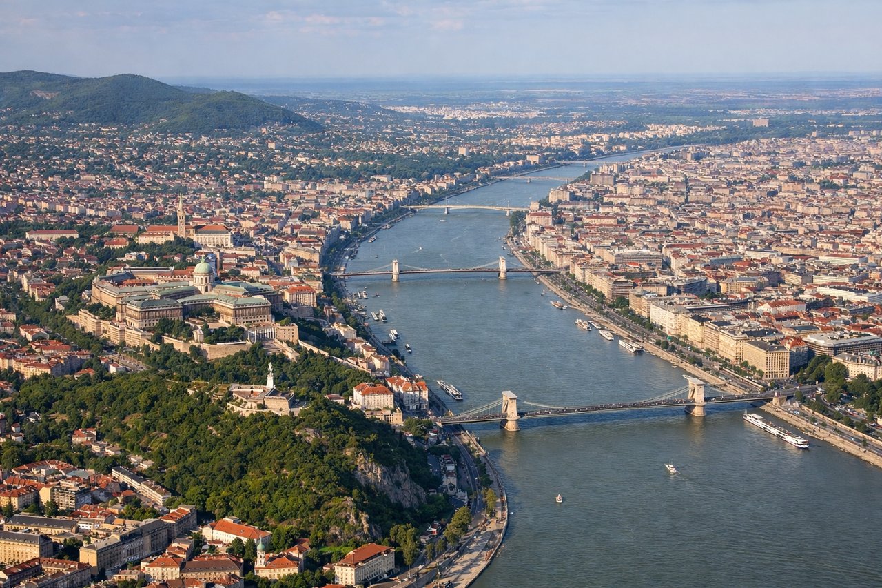 Aerial window seat view during landing at Budapest (left side) — Danube River (multiple meanders), Budapest city center, Buda Hills, Pest plains