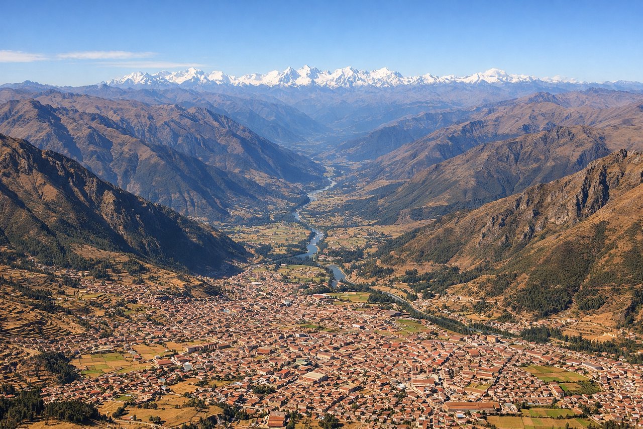 Right window seat view during takeoff from Cuzco (CUZ) — Ausangate peak (6,384m), Vilcanota mountain range, Cusco valley terraced hillsides, Huatanay river valley