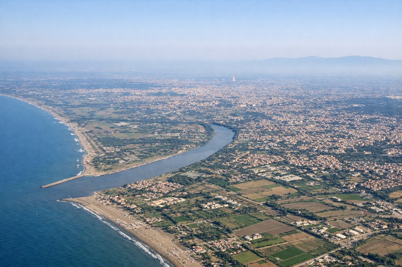 Aerial window seat view during takeoff from Rome (left side) — Tiber River and Rome city center, Tyrrhenian Sea coastline, Alban Hills to the southeast