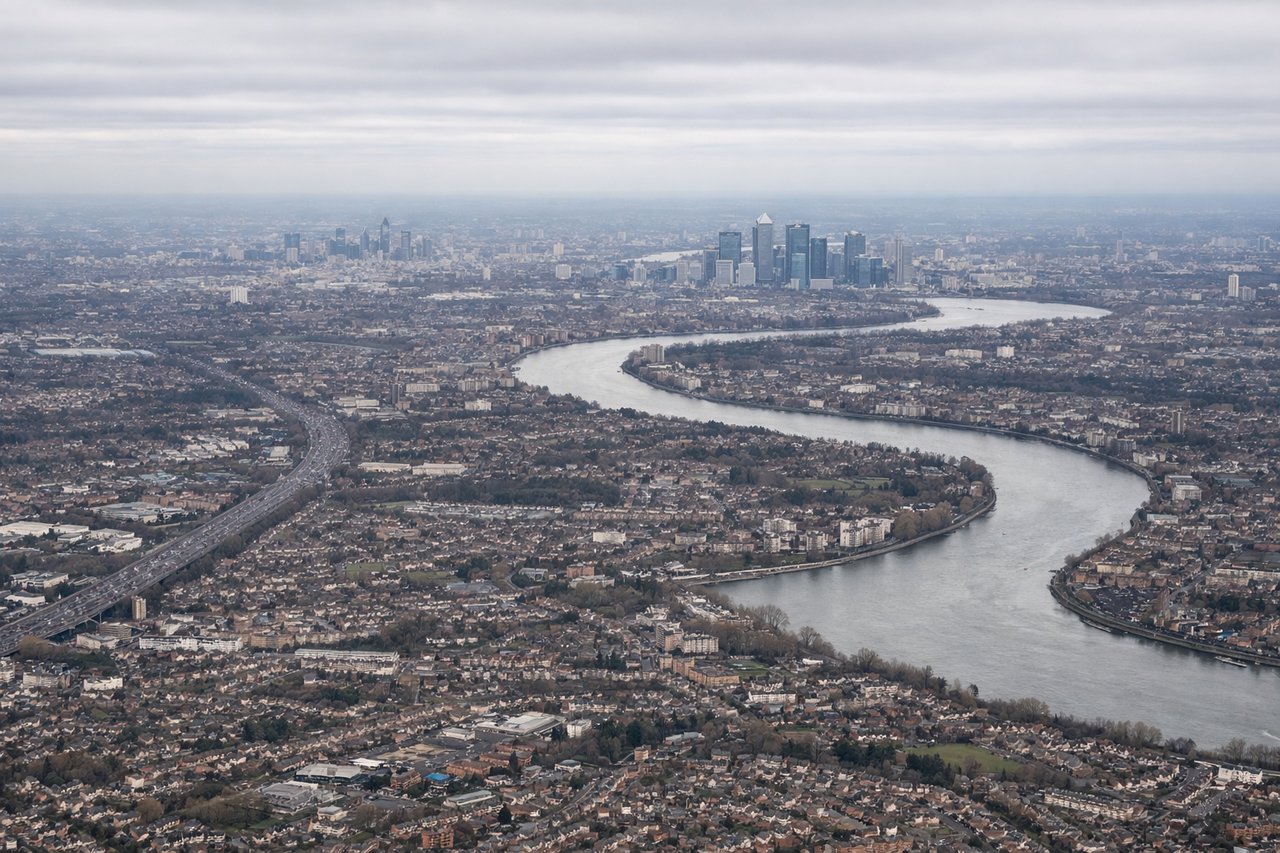 Aerial window seat view during takeoff from London (left side) — River Thames and Windsor Castle, Surrey/Hampshire countryside, Solent and Isle of Wight, Cornish coastline