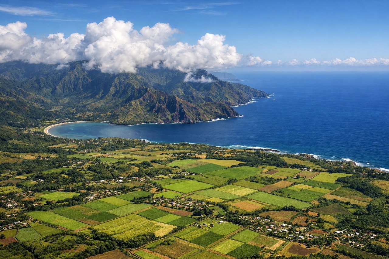 Aerial window seat view during takeoff from Lihue (left side) — Na Pali Coast cliffs, Waimea Canyon, Kauai's central volcanic peaks, Pacific coastline
