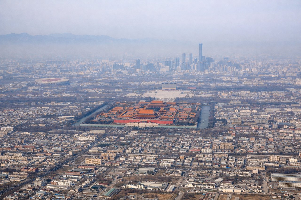 Right window seat view during takeoff from Beijing (PEK) — Beijing urban sprawl, Western Hills (Xishan) foothills, Yan Mountains ridgeline to the north, Chaobai River plain