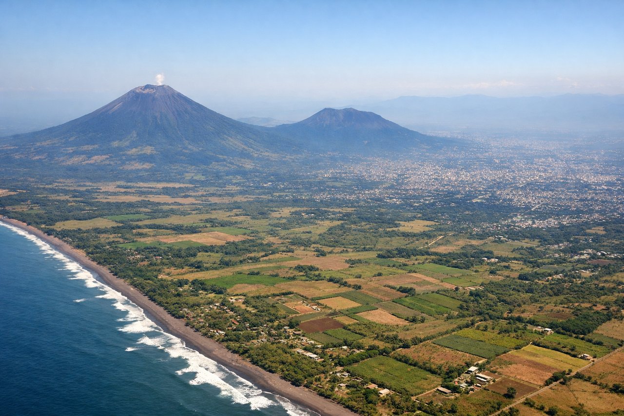 Aerial window seat view during landing at San Salvador (left side) — San Salvador Volcano, Lake Ilopango, Central American highlands, San Salvador city