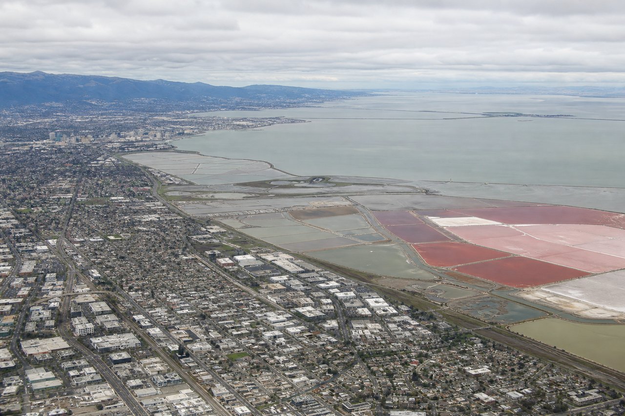 Aerial window seat view during landing at San Jose (right side) — San Francisco Bay, Diablo Range foothills, Santa Clara Valley, San Jose downtown skyline