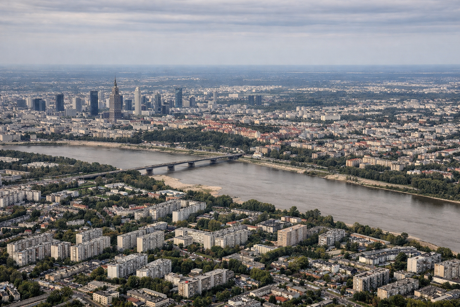 Aerial window seat view during landing at Warsaw (right side) — Vistula River, Warsaw city center skyline, Palace of Culture and Science, Praga district rooftops
